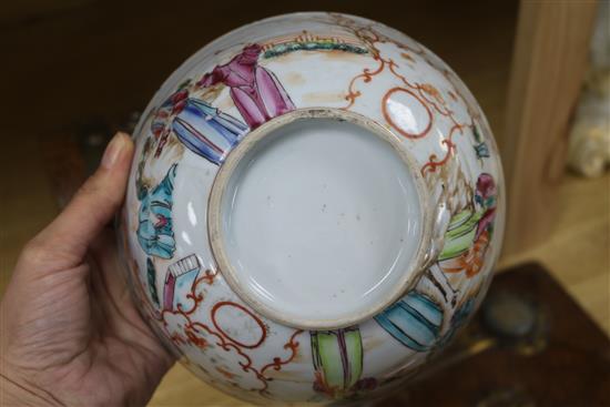 An 18th century Chinese famille rose bowl, wood stand